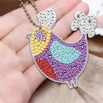 Népművészeti madarak gyémántszemmel kirakható kulcstartók