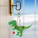 Karácsonyi dínók egy oldalon gyémántszemmel kirakható kulcstartók